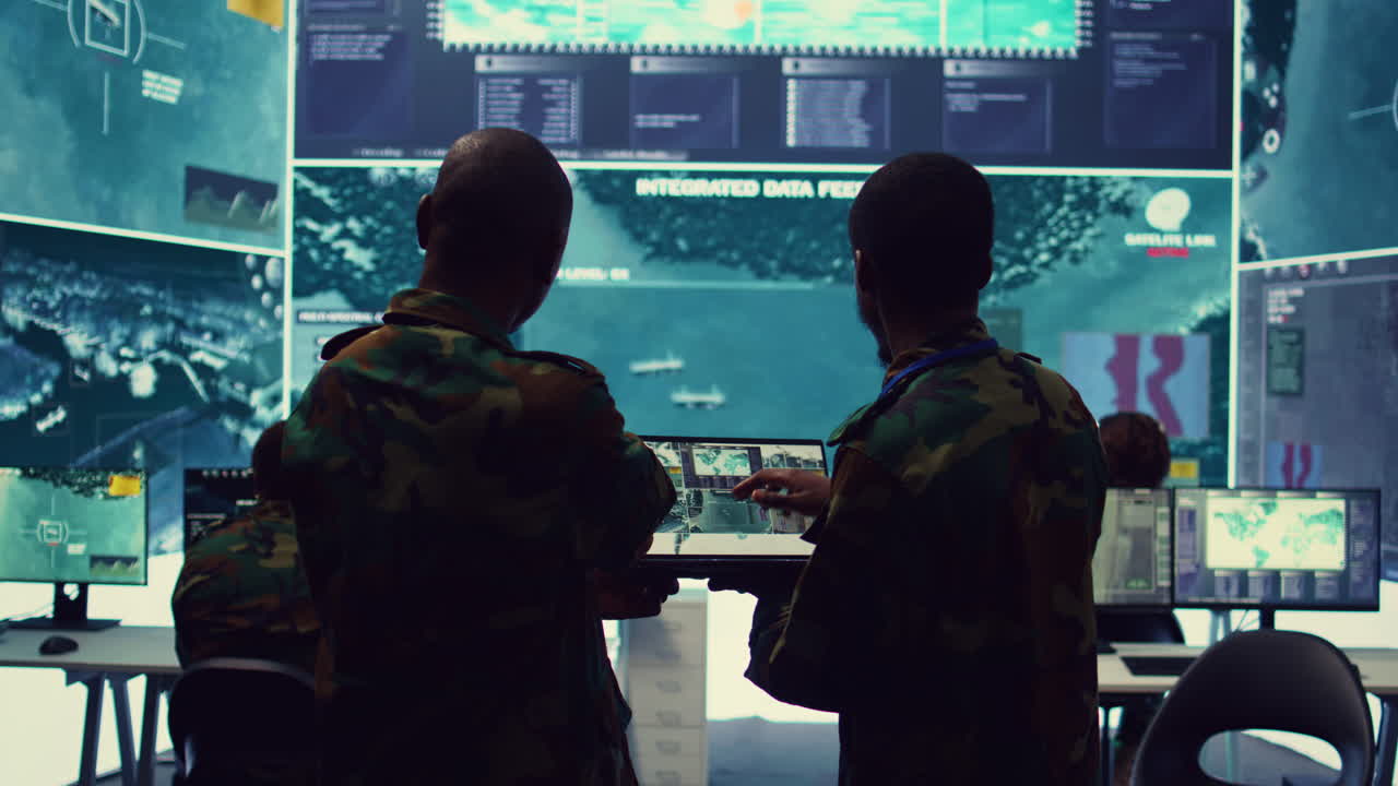 Intelligence analysts supervising and coordinating the big data analysis