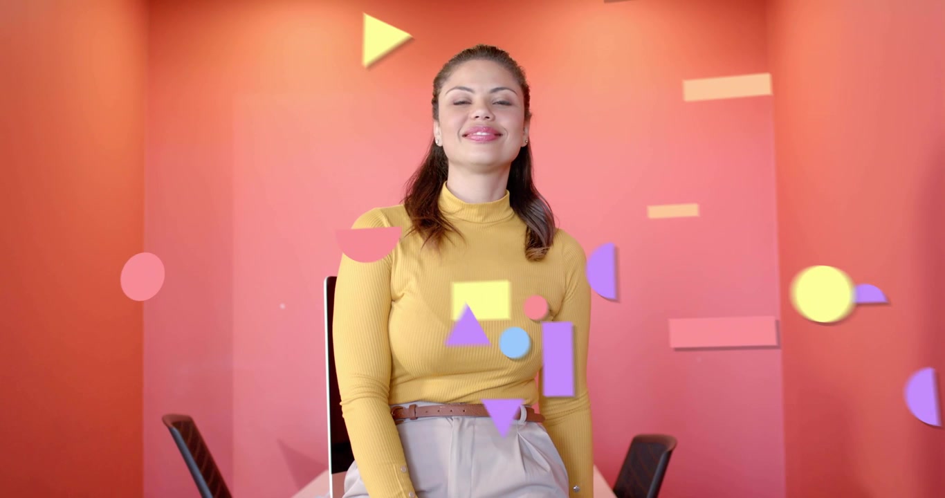 Video verticale: Donna seduta, forme che entrano nell'inquadratura e fluttuano, coprendo parzialmente il viso per il design.