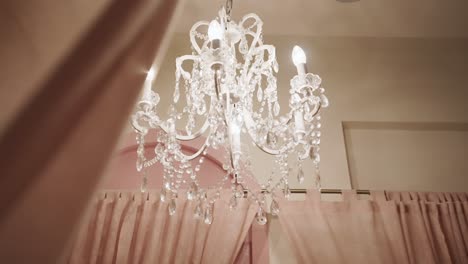 crystal chandelier inside a bedroom