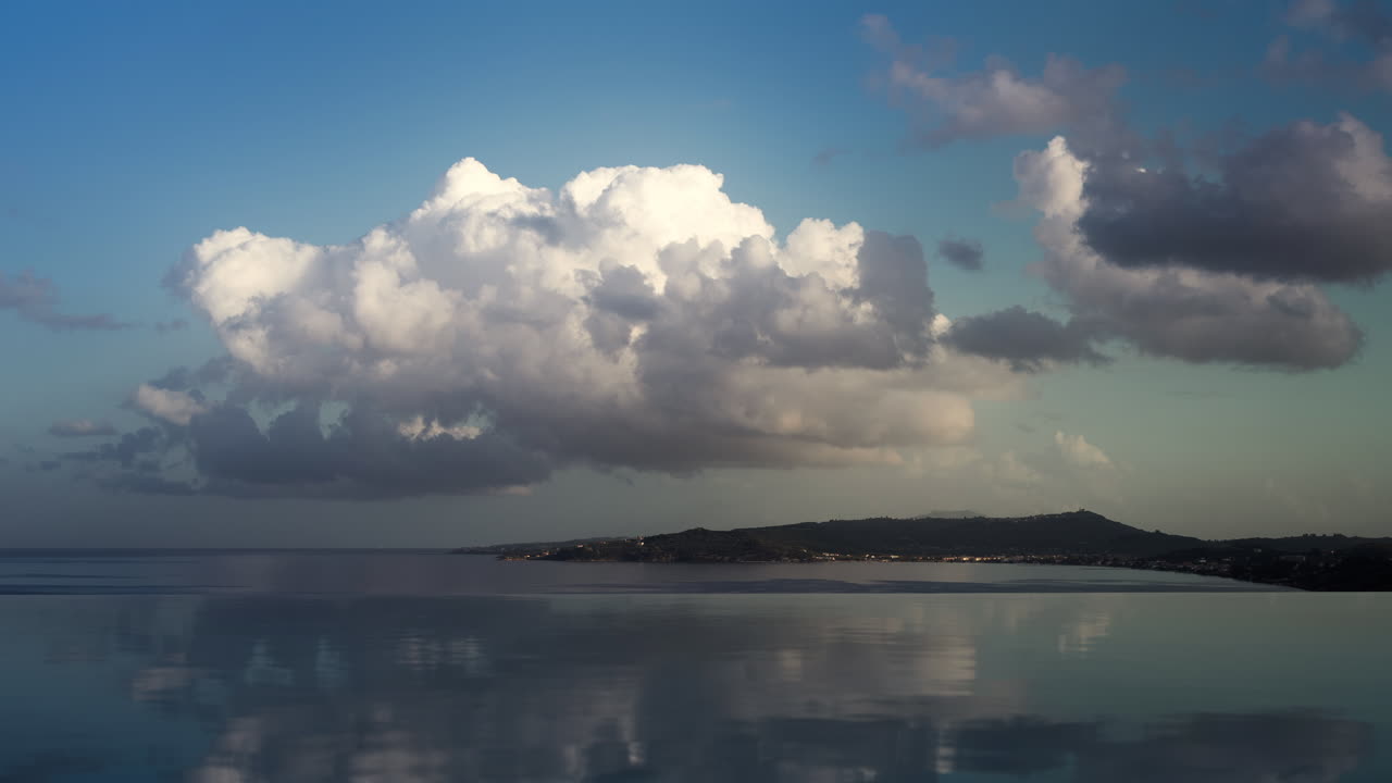 Coastal View with Clouds and Reflections