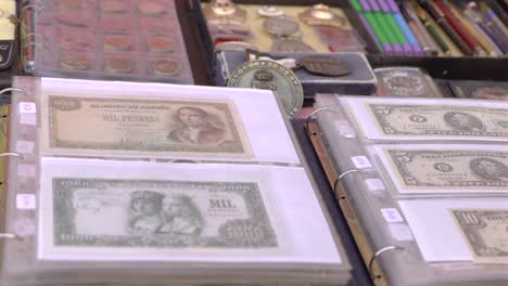 antique currency paper notes being sold in local market in seville
