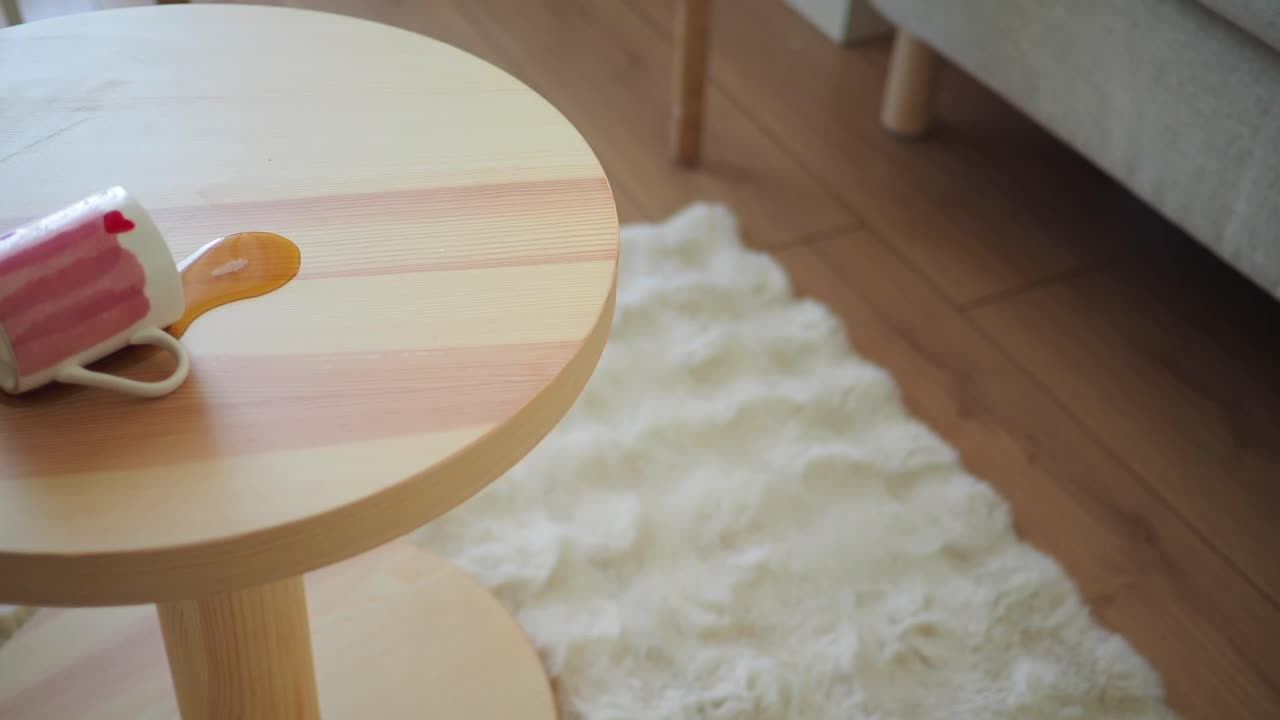 Spilled coffee on a wooden table