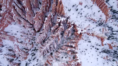 Aerial-4K-footage-of-Bryce-Canyon-National-Park-covered-in-snow-in-Utah,-USA