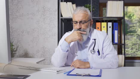 the senior doctor is stressed and overwhelmed.