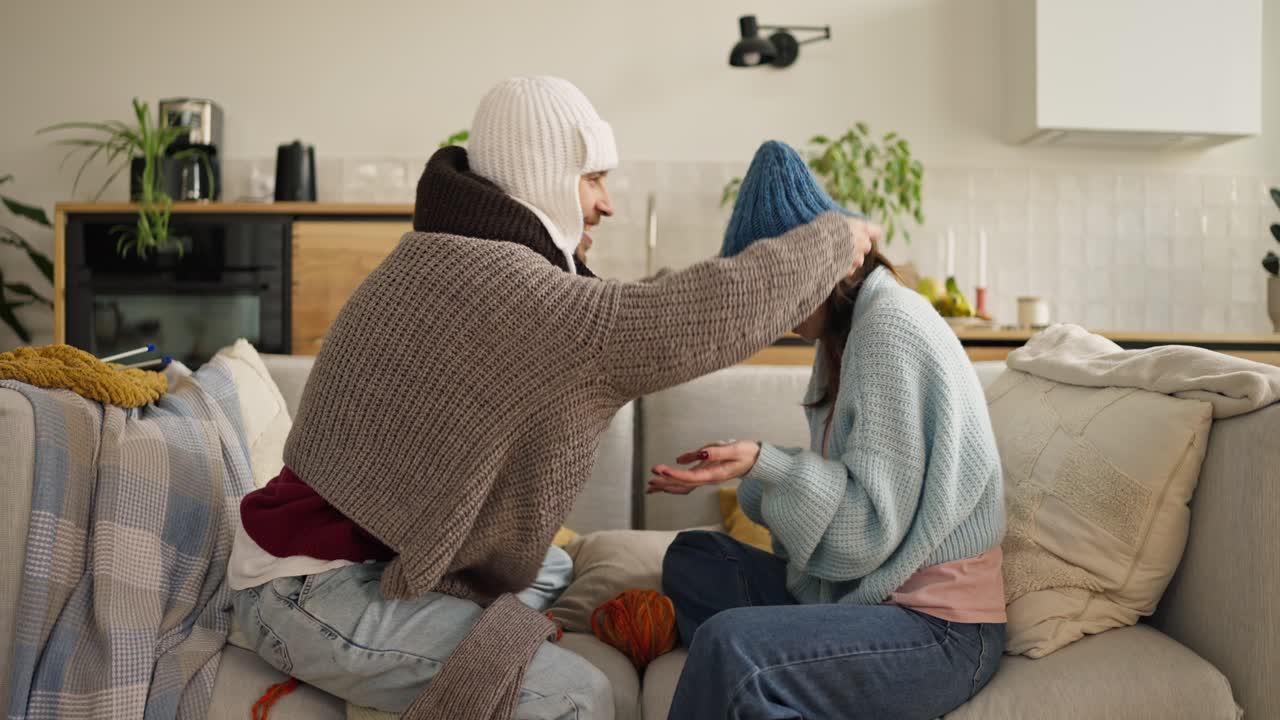 Couple Knitting Together