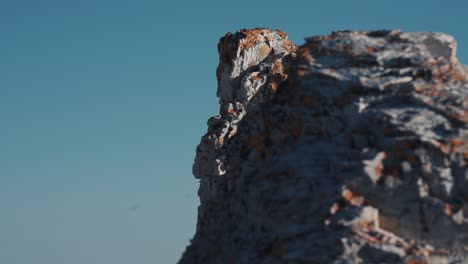 a close-up view of the rocky dolomite stone formations of the trollholmsund beach in norway-1