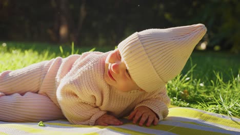 baby girl playing and sleeping in a park
