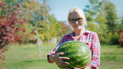 Happy-Woman-With-Large-Watermelon