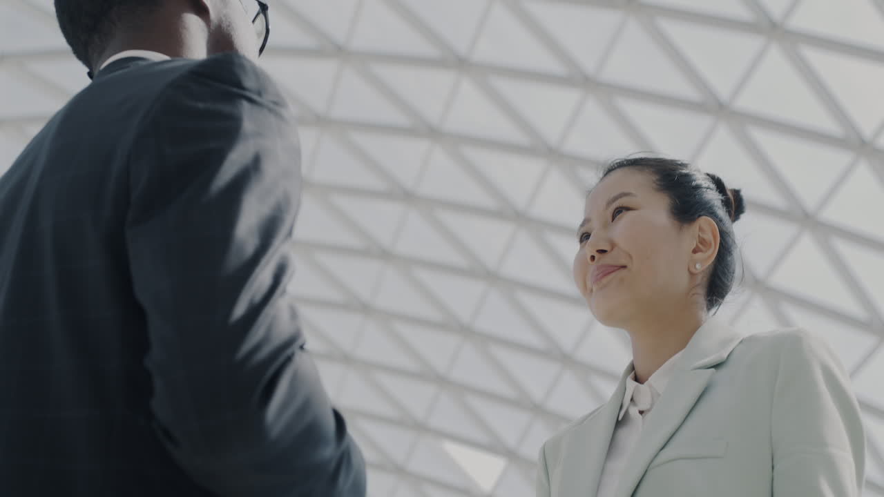 Business Meeting in Modern Building