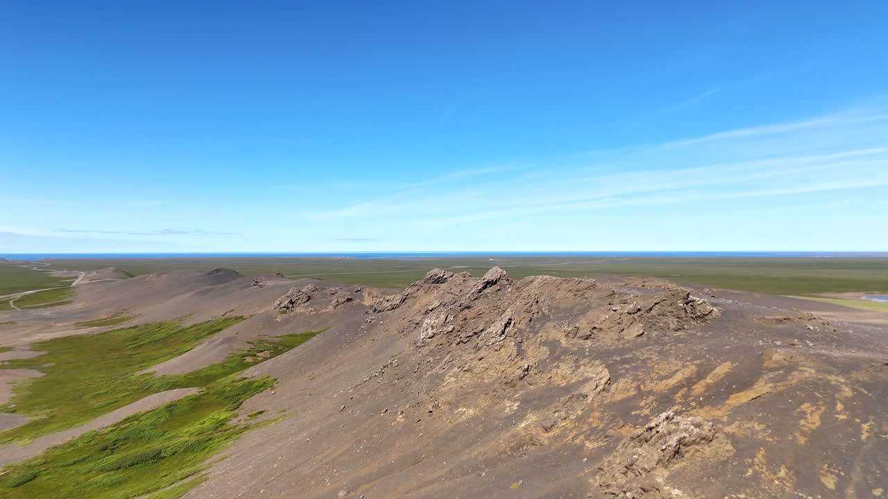 Aerial view of the desolate Melrakkaslétta highlands between Raufarhöfn and Kópasker, showing vast open terrain, rugged textures, and isolated Icelandic wilderness