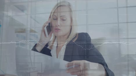 animation of caucasian entrepreneur talking on phone with laptop over time lapse of people and dots