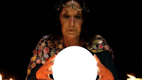 clairvoyant looking in her crystal ball