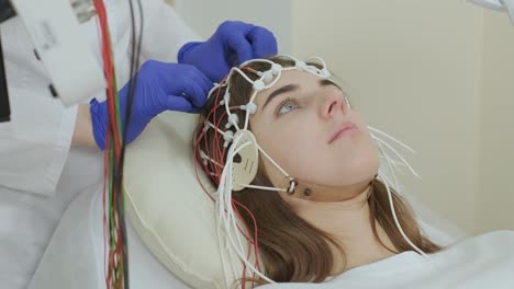 patient brain testing using encephalography at medical center