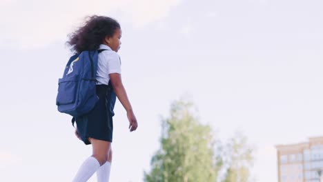 schoolgirl running up stairs