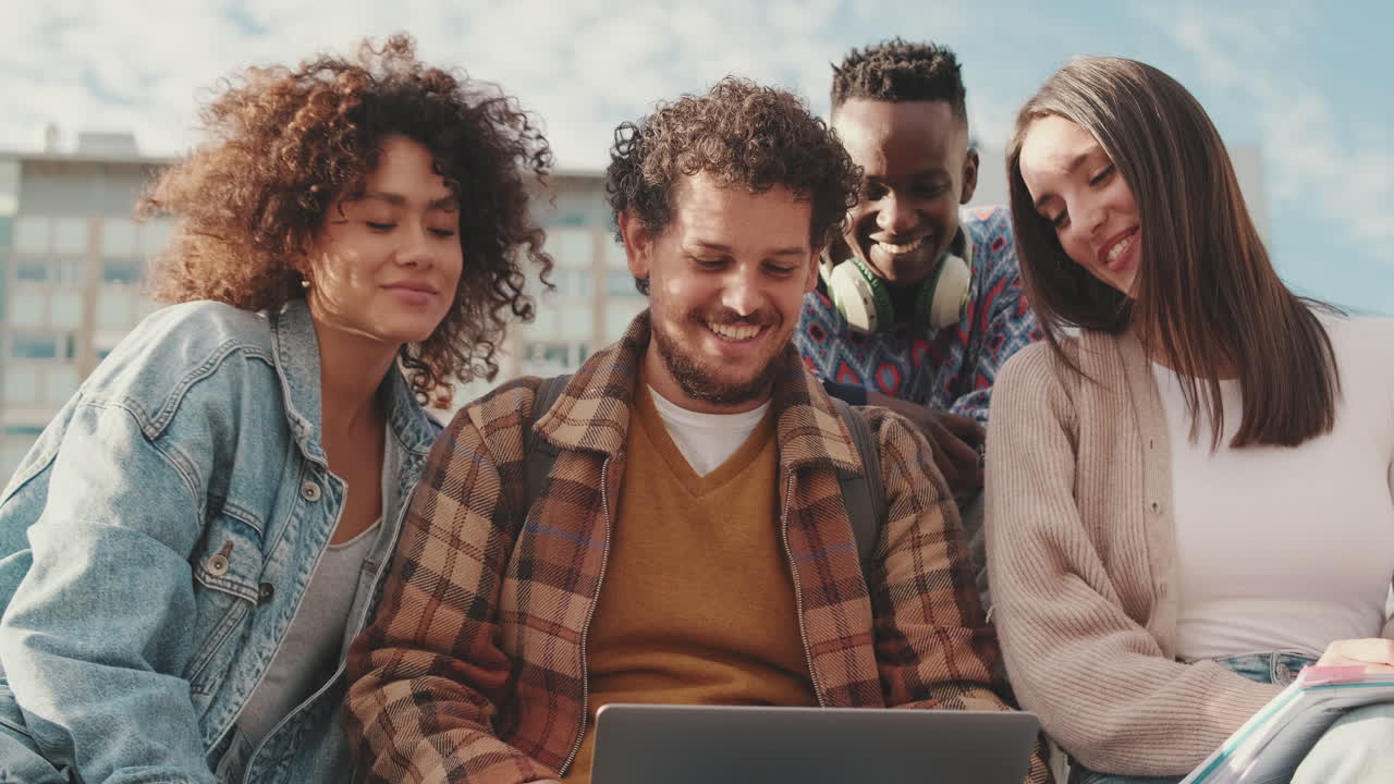 Group of students studying together on campus