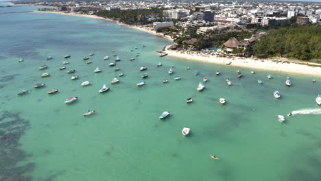 Yacht-fleet-anchoring-along-coastline-beach-resort-of-Playa-del-Carmen