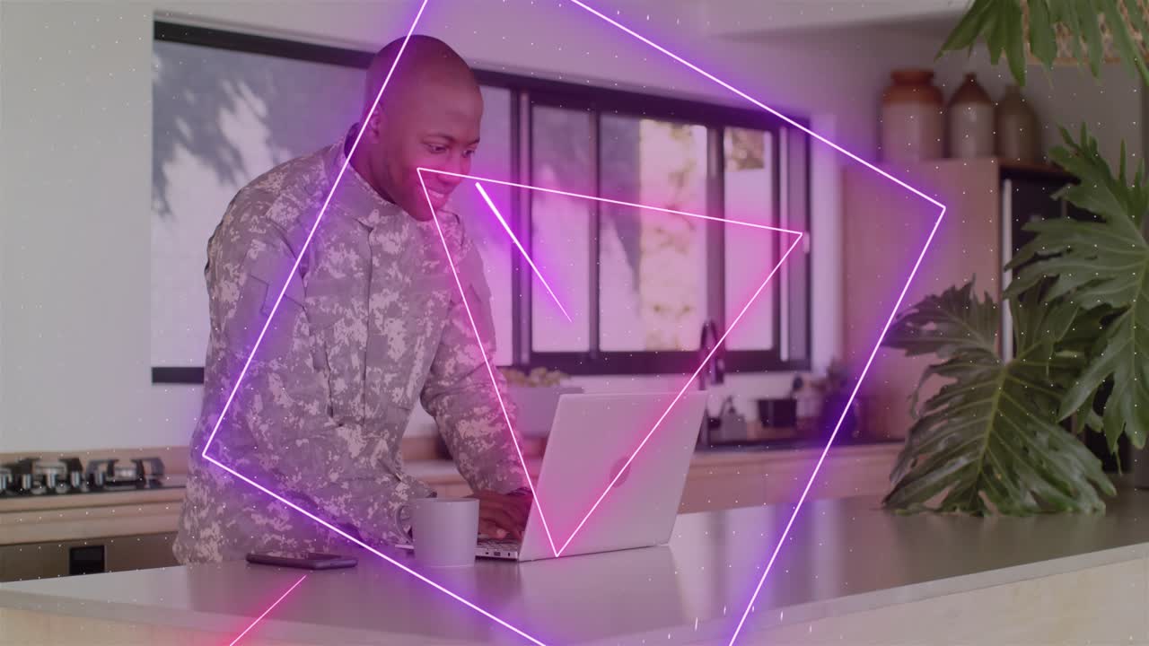 Man in camo leaning, typing laptop after phone ping, animated magenta shapes marking tech progress