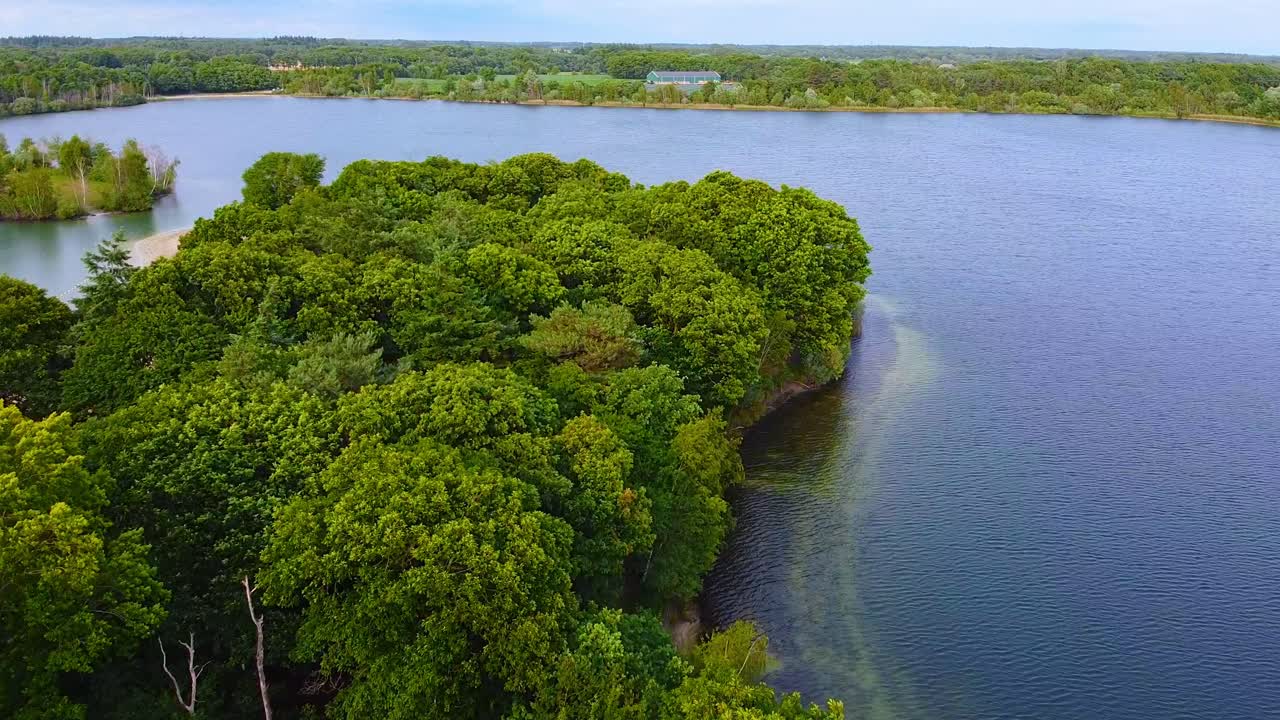 Aerial view above scenic nature landscape in the countryside of breda, beautiful clear lake.