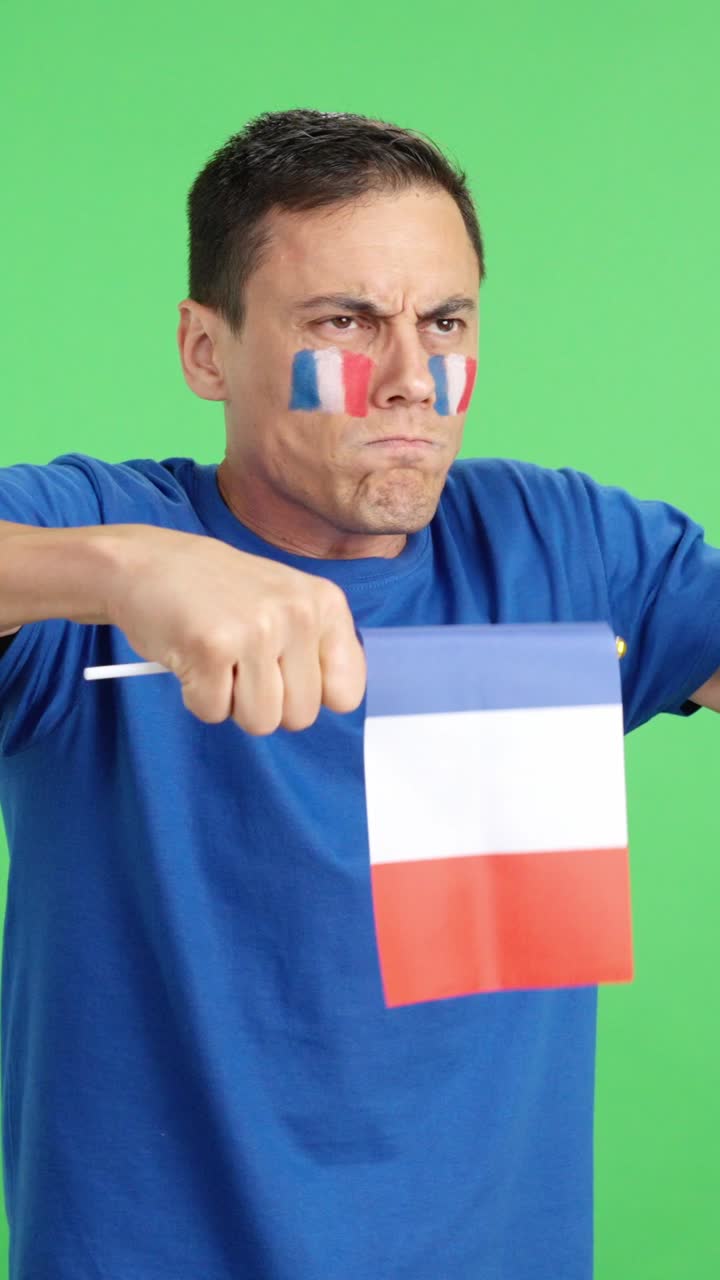 French supporter angry with the decision of the referee