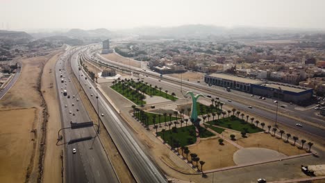 palm tree park over the commute of jeddah city all the way to mecca city