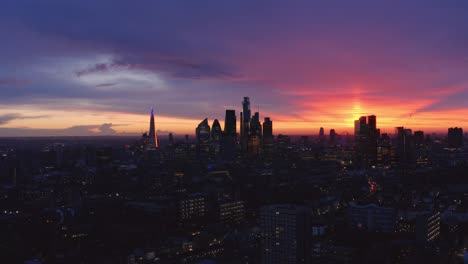 beautiful aerial slider drone shot of central london at dusk sunset