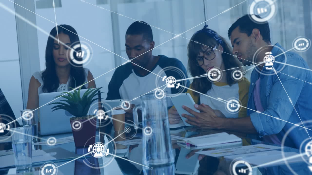 Animation of network of connections with icons over diverse colleagues discussing work