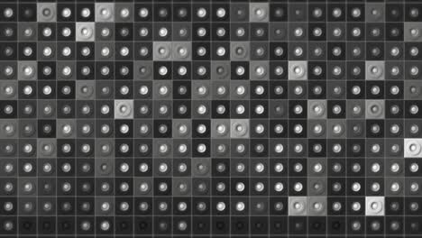 animación digital de la pared de patrón de mosaico, bucle sin costuras. movimiento. cuadrados parpadeantes monocromáticos con pequeños puntos en el medio.
