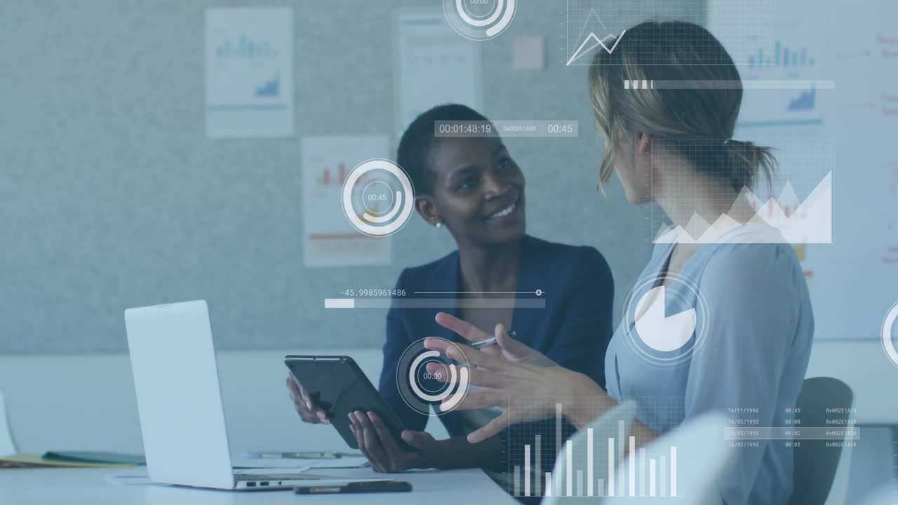 Business data charts and graphs animation over colleagues discussing work in office