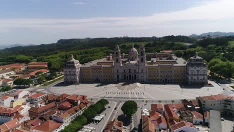 fly aboveaerial view of the national palace of mafra in portugal