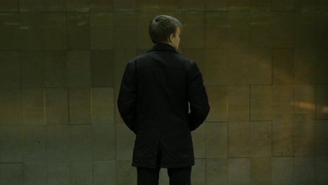 teenager waiting for the subway