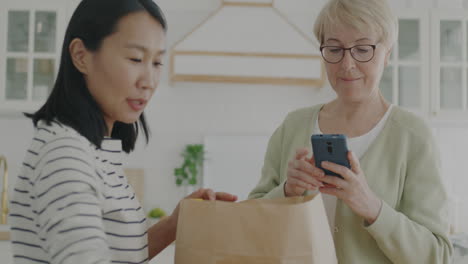food delivery, woman scanning order