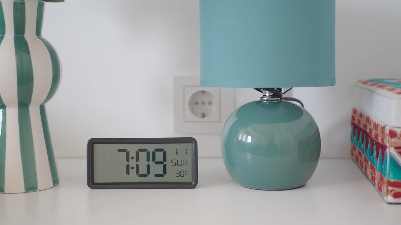 Stylish Nightstand Decor with Clock and Lamp