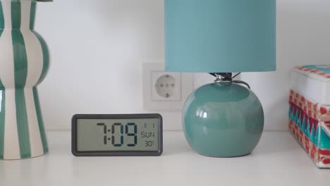 stylish nightstand decor with clock and lamp