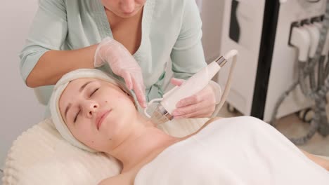 micro-needle rf lifting procedure in the modern cosmetology clinic. hadware cosmetology