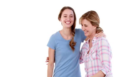 Mother-and-daughter-carrying-rug-together