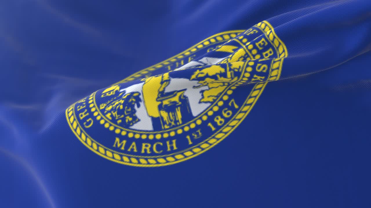 Bandiera dello stato americano del Nebraska, Stati Uniti, che sventola al vento. Loop