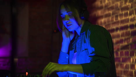 woman djing at the disco