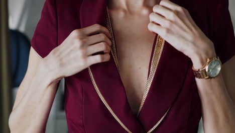 stylish woman in a red blazer on a plane