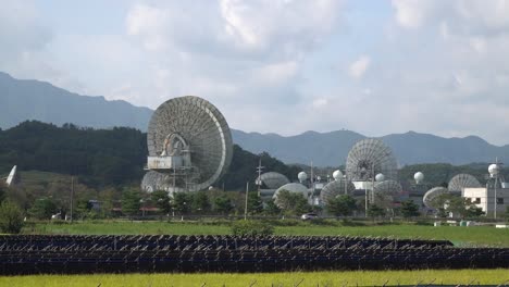 kt sat satellite center in geumsan, south korea at daytime - zoom-out shot