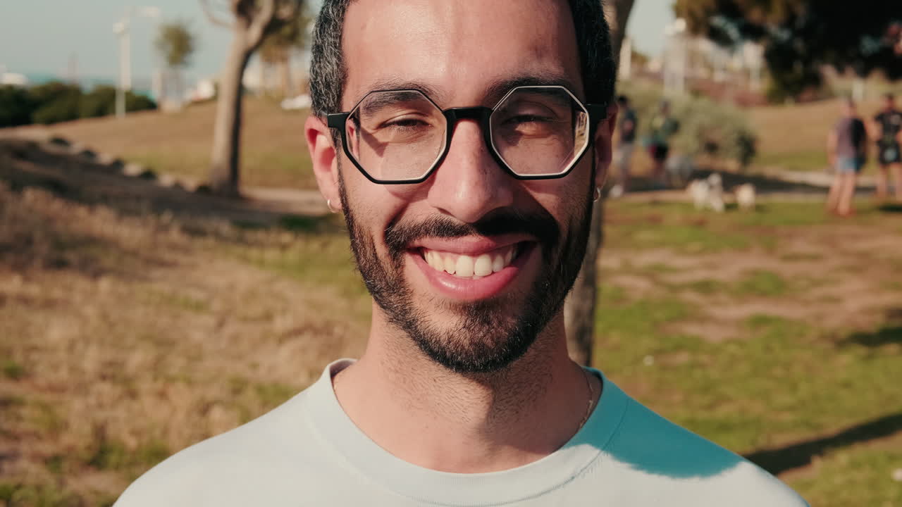 Happy Man Smiling at Picnic in the Park