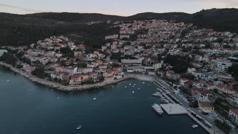 beautiful-aerial-of-Rabac,-kvarner-bay-at-sunset-in-Istria,-Croatia