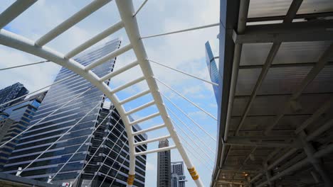 skywalk at chong nonsi bangkok thailand, bridge building of bts train station and around office space.