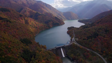 a drone view of japanese alps and its lakes and dam during autumn