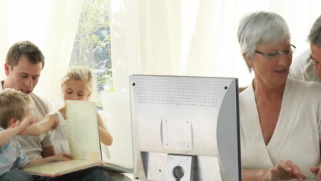 Loving-Grandmother-playing-with-Grandchildren-at-home