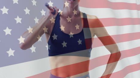 animación de la bandera de los ee.uu. sobre atleta femenina afroamericana