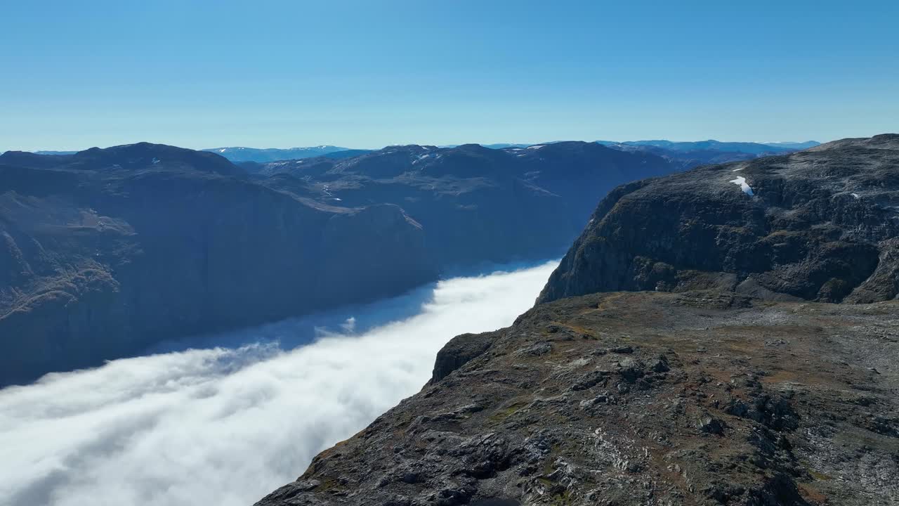 Stunning Aerial View of a Mountain Valley with Fog