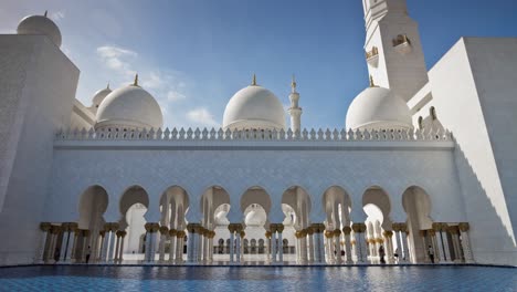 famous sunny day abu dhabi grand mosque white front hall water panorama 4k time lapse uae