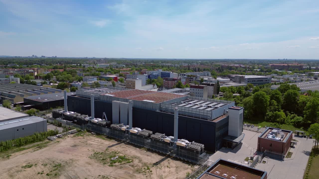 Big Data cloud storage, Industrial air con system cooling Ai farm in a large data center in berlin Europe. Magic aerial view flight ascending drone