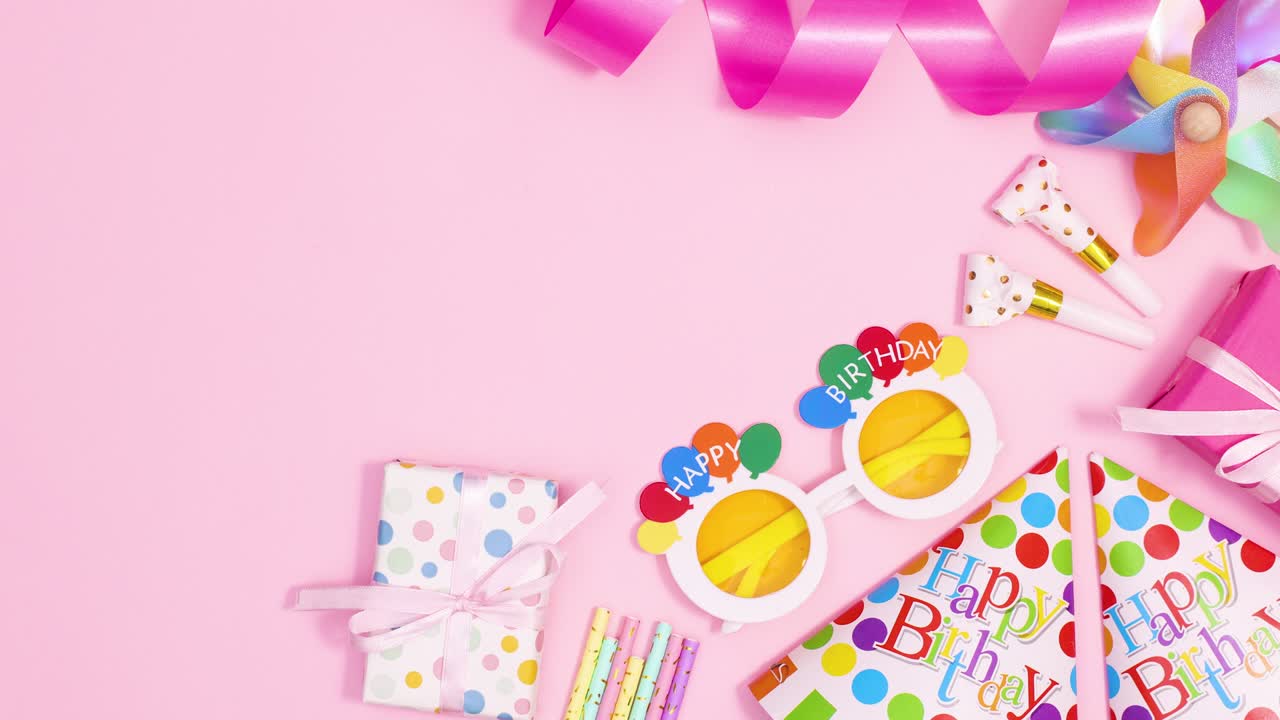 Birthday party decorations and accessories appear on right side of pastel pink theme. Stop motion