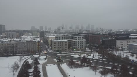 drone video of warsaw city skyline on a snowy and foggy day5
